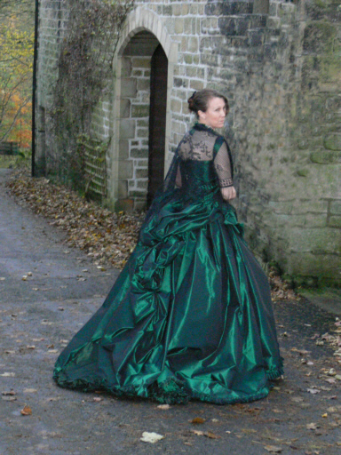 green fit bustle gown